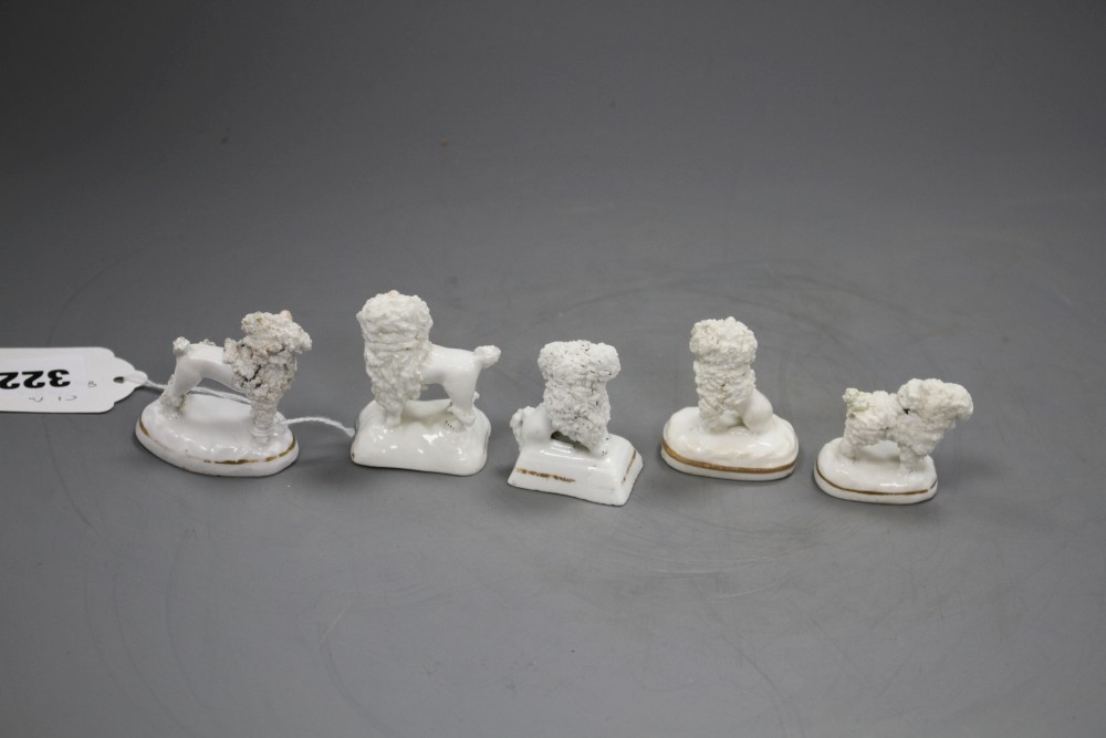 Five Staffordshire porcelain toy figures of poodles, c.1835-50, H. 3.8 - 5cm